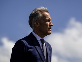 Canadian Prime Minister Mark Carney speaks about the trade dispute with the United States at the Davie Shipyard in Levis, Quebec, Canada on August 24, 2026.