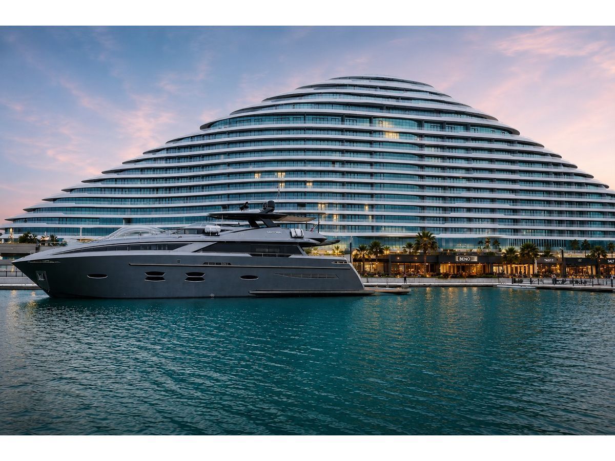 Beno's guest lounge on the marina promenade at Marsa Al Arab, Dubai, with the 115-ft yacht Santorini berthed opposite