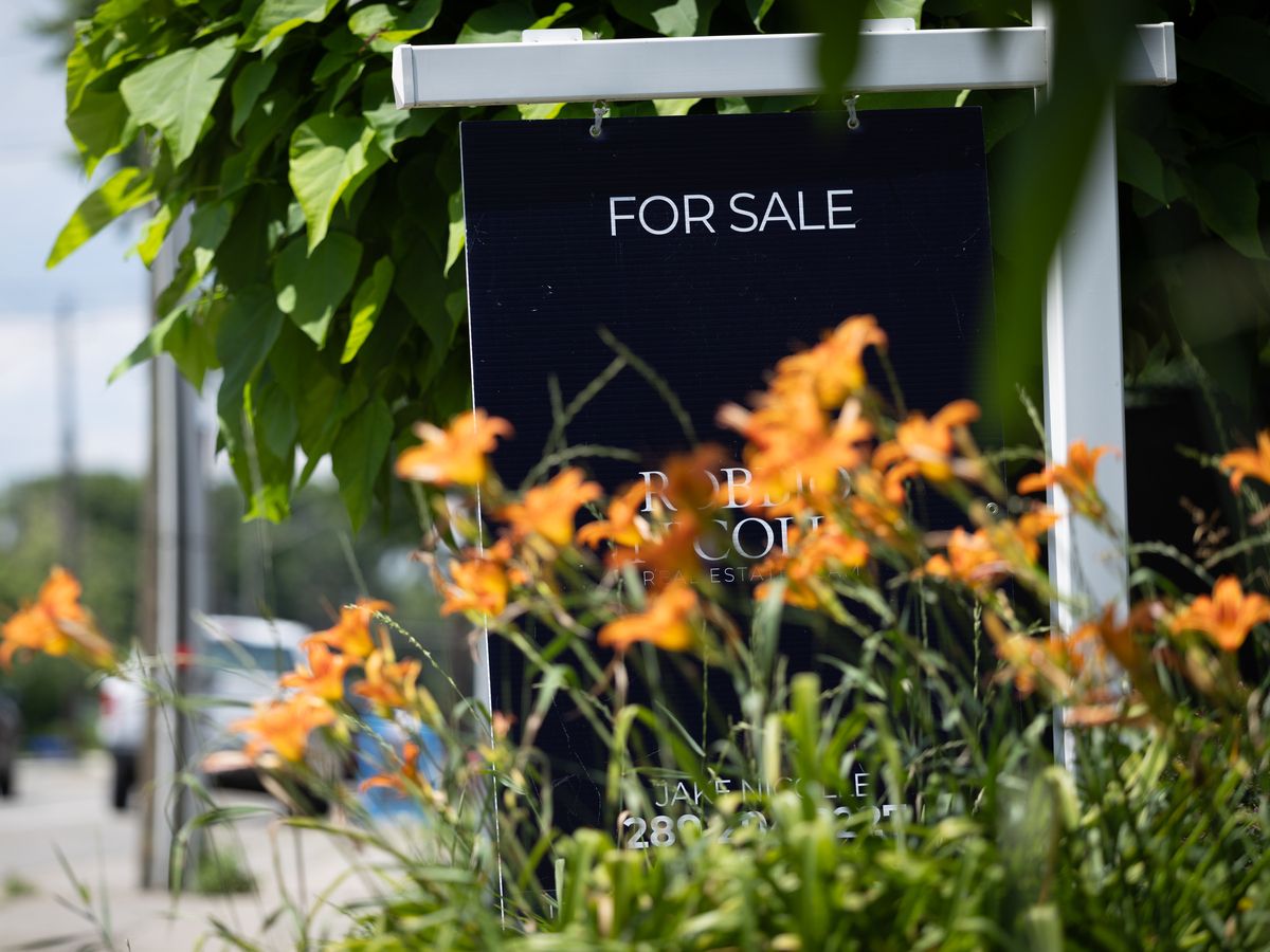 A home for sale signage on Beach Boulevard in Hamilton, Ont.