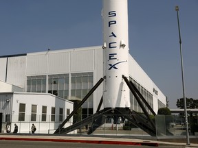 A SpaceX Falcon 9 rocket is displayed at a SpaceX facility in Hawthorne, California.