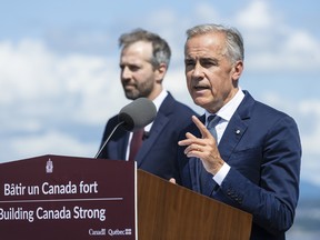 Prime Minister Mark Carney talks during a press conference at the Davie Shipyard in Levis, Que., Aug. 24, 2026.