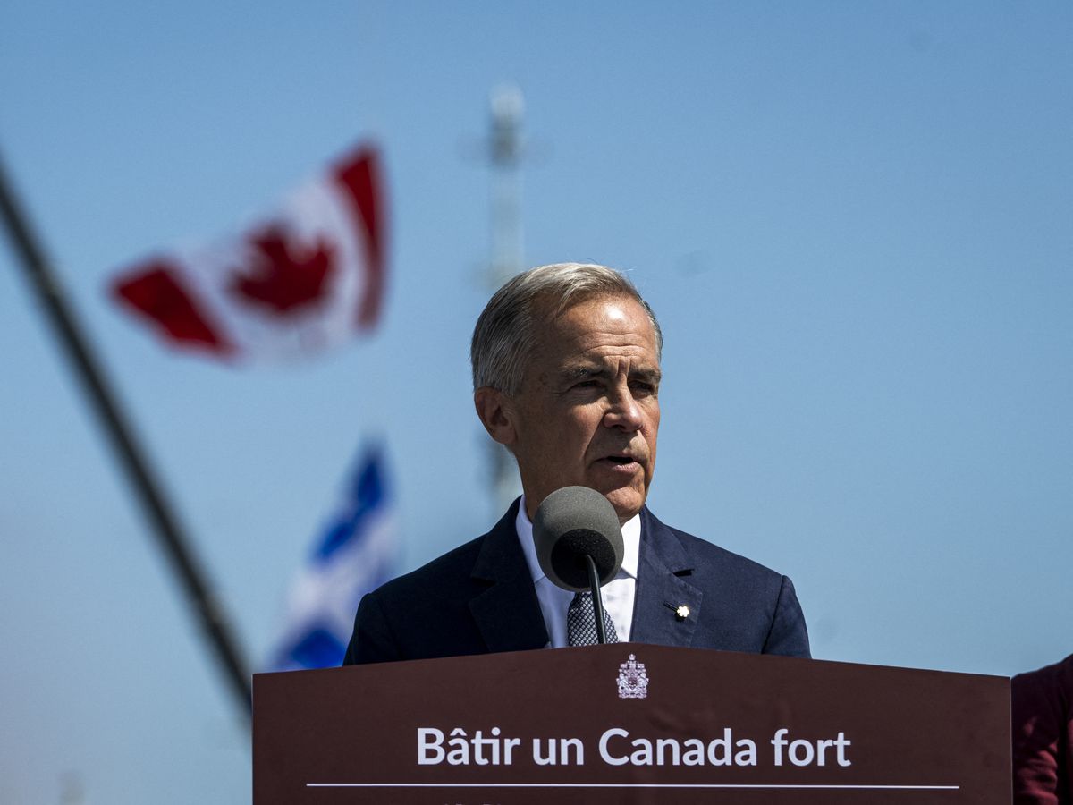 Prime Minister Mark Carney speaks about the trade dispute with the United States at the Davie Shipyard in Levis, Que., on Aug. 24, 2026.