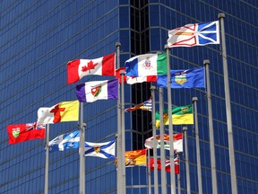 Flags of Canada's provinces and territories flying at Canada Place, Vancouver, B.C.