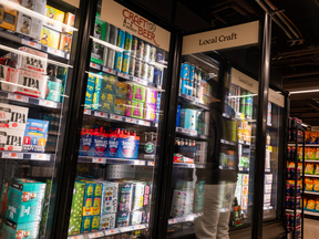 Beer cans are displayed on a grocery store shelf on February 11, 2025 in New York City.