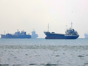 Vessels transit the Hormuz Strait off the coast of Iran's southern port city of Bandar Abbas on September 7, 2026.