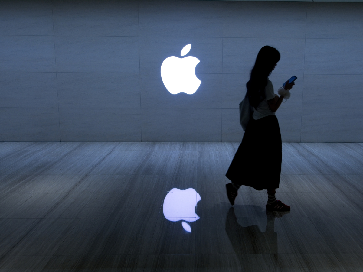 People walk in front of an Apple retail store in Lujiazui, Shanghai, China, on September 6, 2026.