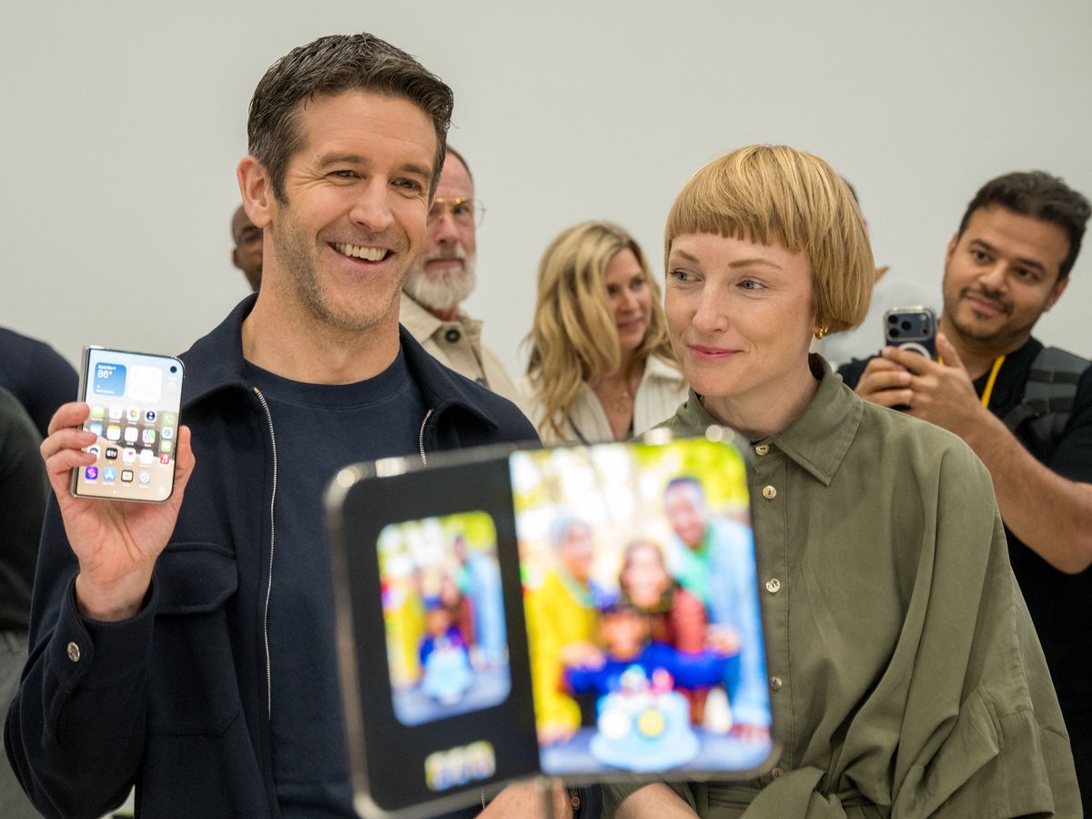 Apple CEO John Ternus, alongside vide president of industrial design Molly Anderson, shows off the new iPhone Duo during an Apple event at the Steve Jobs Theater in Apple Park in Cupertino, California, on Sept. 9, 2026.