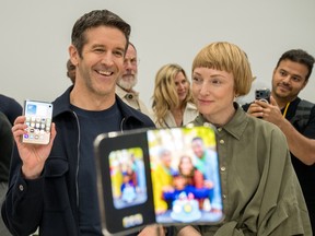 Apple CEO John Ternus, alongside vide president of industrial design Molly Anderson, shows off the new iPhone Duo during an Apple event at the Steve Jobs Theater in Apple Park in Cupertino, California, on Sept. 9, 2026.