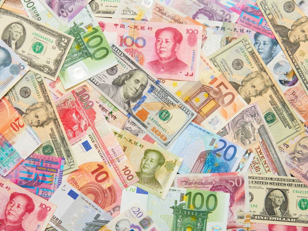 In this photo illustration a collection of global paper currency, on December 16,2021 in London, England.