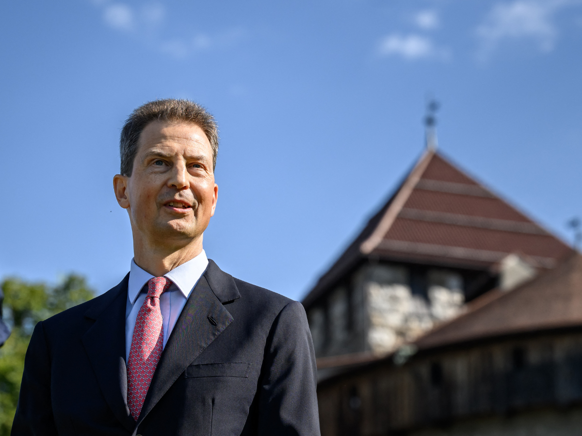 Liechtenstein's Hereditary Prince Alois looks on in front to Vaduz Castle, the palace and official residence of the princely family, during a press meeting prior to Liechtenstein's National Day celebrations in Vaduz, on August 15, 2026.