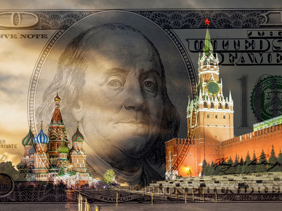 Red Square, Moscow Kremlin on the background of 100 dollar bill. Economic sanctions. Russia - stock photo