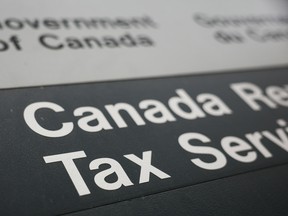 Canada Revenue Agency Tax Services Office sign in Ottawa on Aug. 7, 2026.