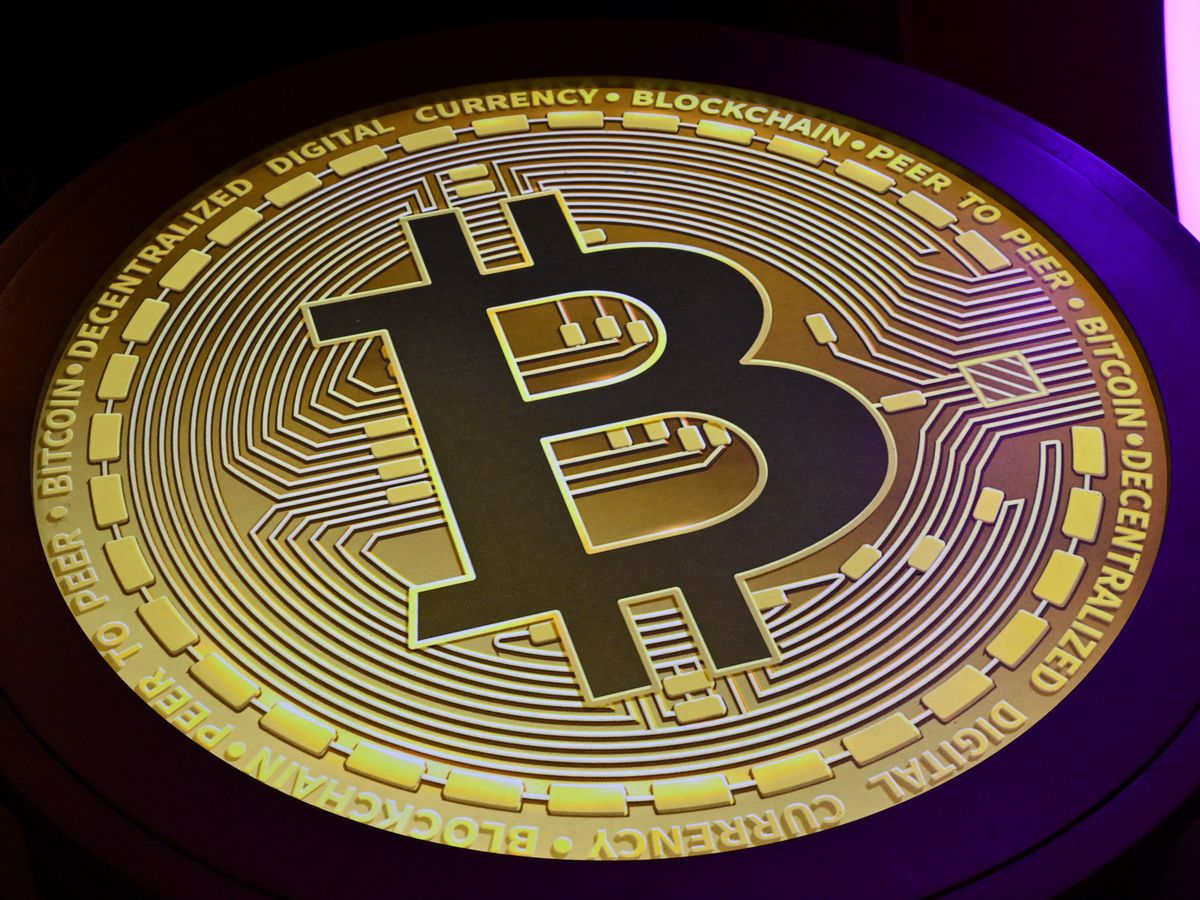 The Bitcoin logo is displayed during the Token2049 conference in Dubai on April 30, 2025.
