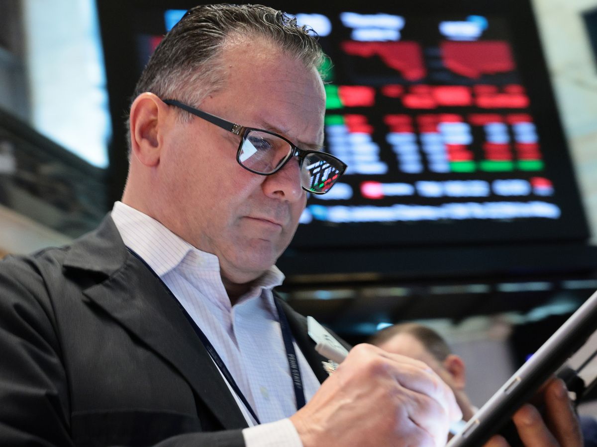 Traders work on the floor of the New York Stock Exchange during morning trading on June 04, 2026 in New York City.
