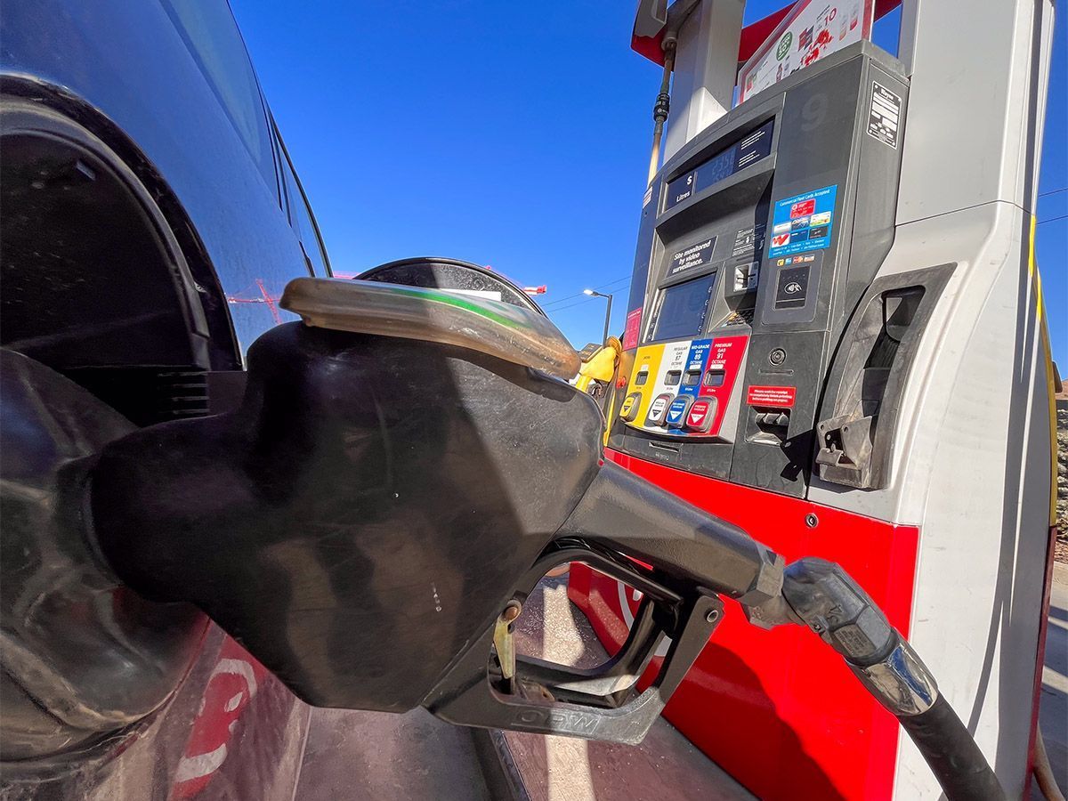 A car is filled with gas in Calgary on Saturday, March 22, 2025. Gas prices are rising following war on Iran, and they could keep going up.