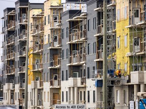 A large residential apartment block being built by Drewlo just off of Bradley Avenue, east of Highbury in London, Ont., on Nov. 21, 2025.