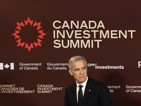 Prime Minister Mark Carney looks on after conducting a press conference at the Canada Investment Summit at The Royal York Hotel in Toronto, Sept. 15, 2026.