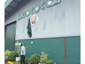 RIOCOCO CEO Shan Halamba unveils a commemorative sign marking the company's 22nd anniversary at its production headquarters in Sri Lanka.