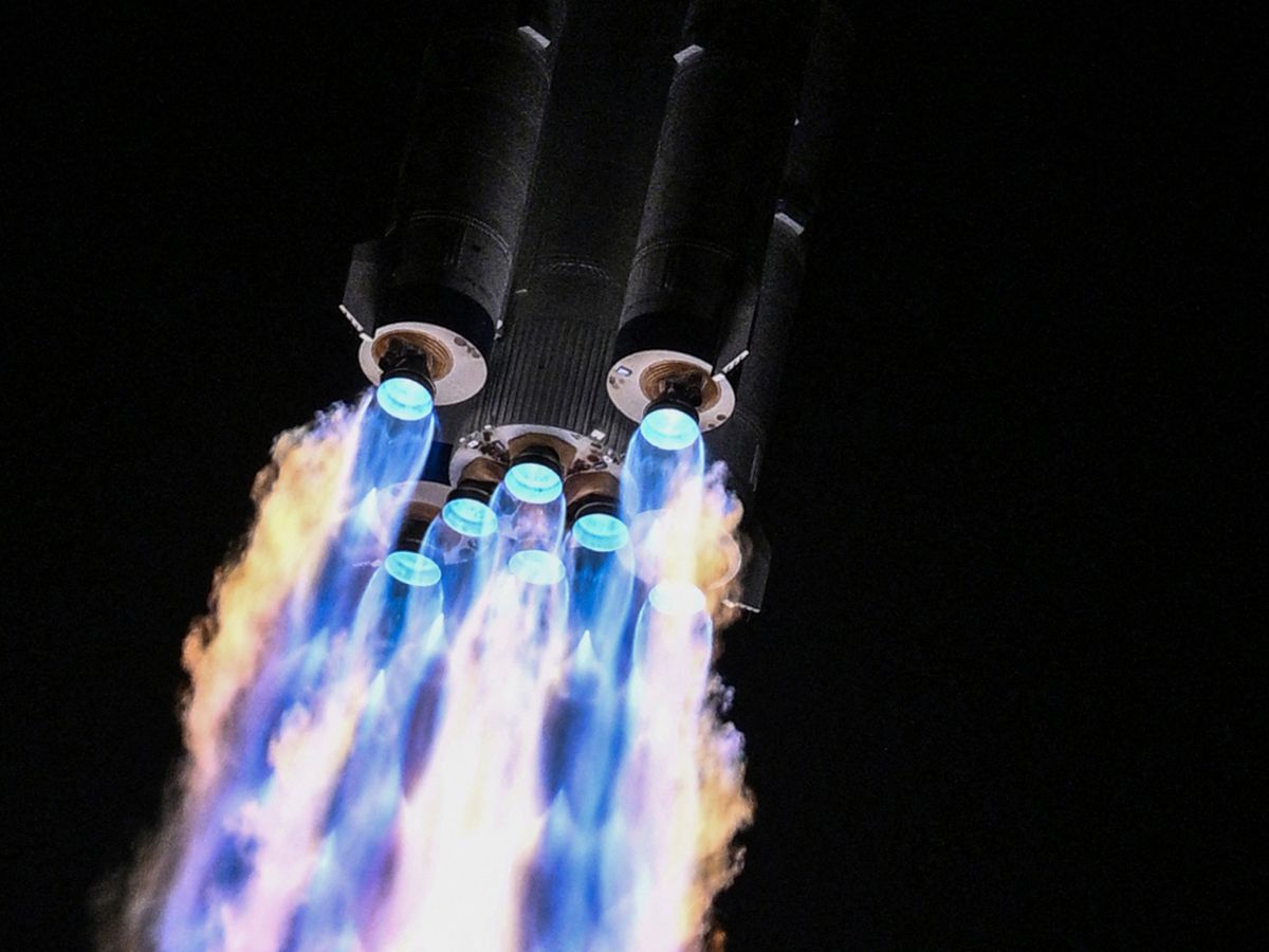 A Long March-2F carrier rocket, carrying the Shenzhou-21 spacecraft and a crew of three astronauts, lifts off from the Jiuquan Satellite Launch Centre in the Gobi desert, in northwest China on October 31, 2025.