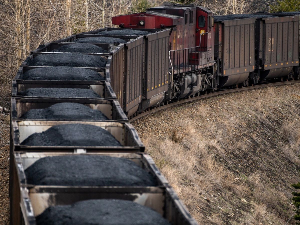 Rail cars loaded with coal near a Teck Resources Elkview Operations steelmaking coal mine in the Elk Valley near Sparwood, British Columbia, Canada, on Tuesday, April 26, 2022.