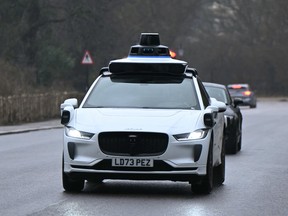 A car from U.S. self-driving car company Waymo is pictured in the streets of central London on February 5, 2026.