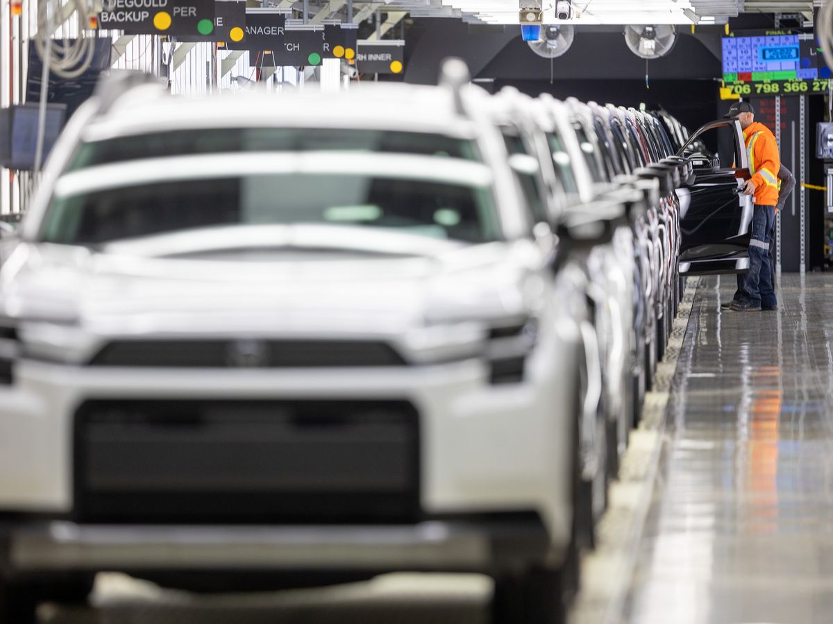 Workers inspect the 2026 Rav4 at the final inspection bay at Toyota’s assembly plant in Woodstock during a press reveal on Friday January 23, 2026.