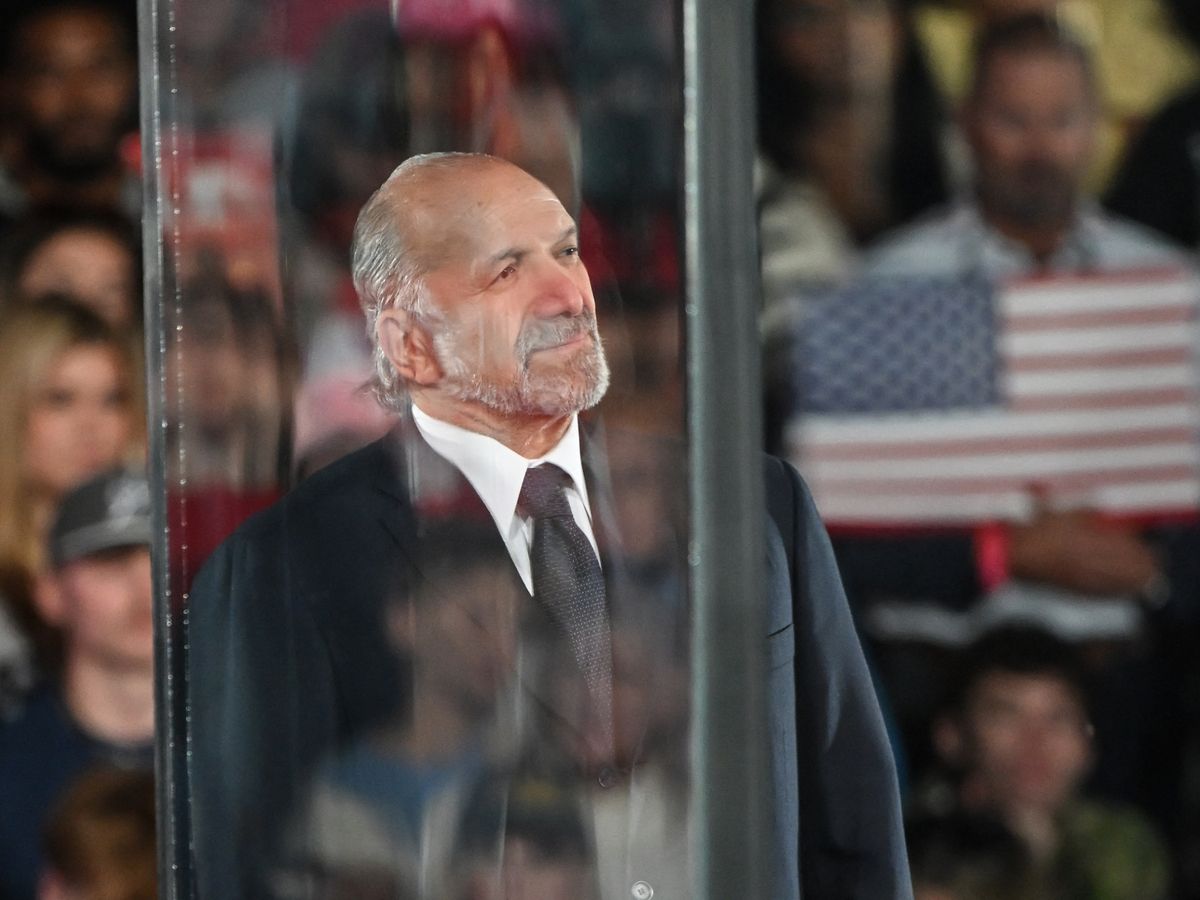 U.S. Secretary of Commerce Howard Lutnick looks on from behind a transparent bulletproof partition as US President Donald Trump speaks during a midterm campaign rally at Pitt-Greenville Airport in Greenville, North Carolina, on October 20, 2026.