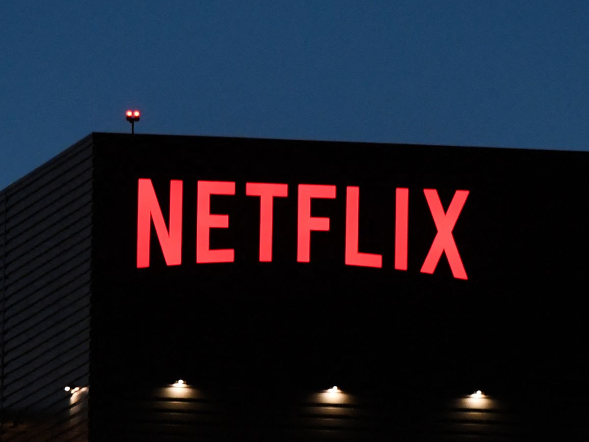 The Netflix logo is seen on the Netflix, Inc. building on Sunset Boulevard in Los Angeles, California on October 19, 2021.