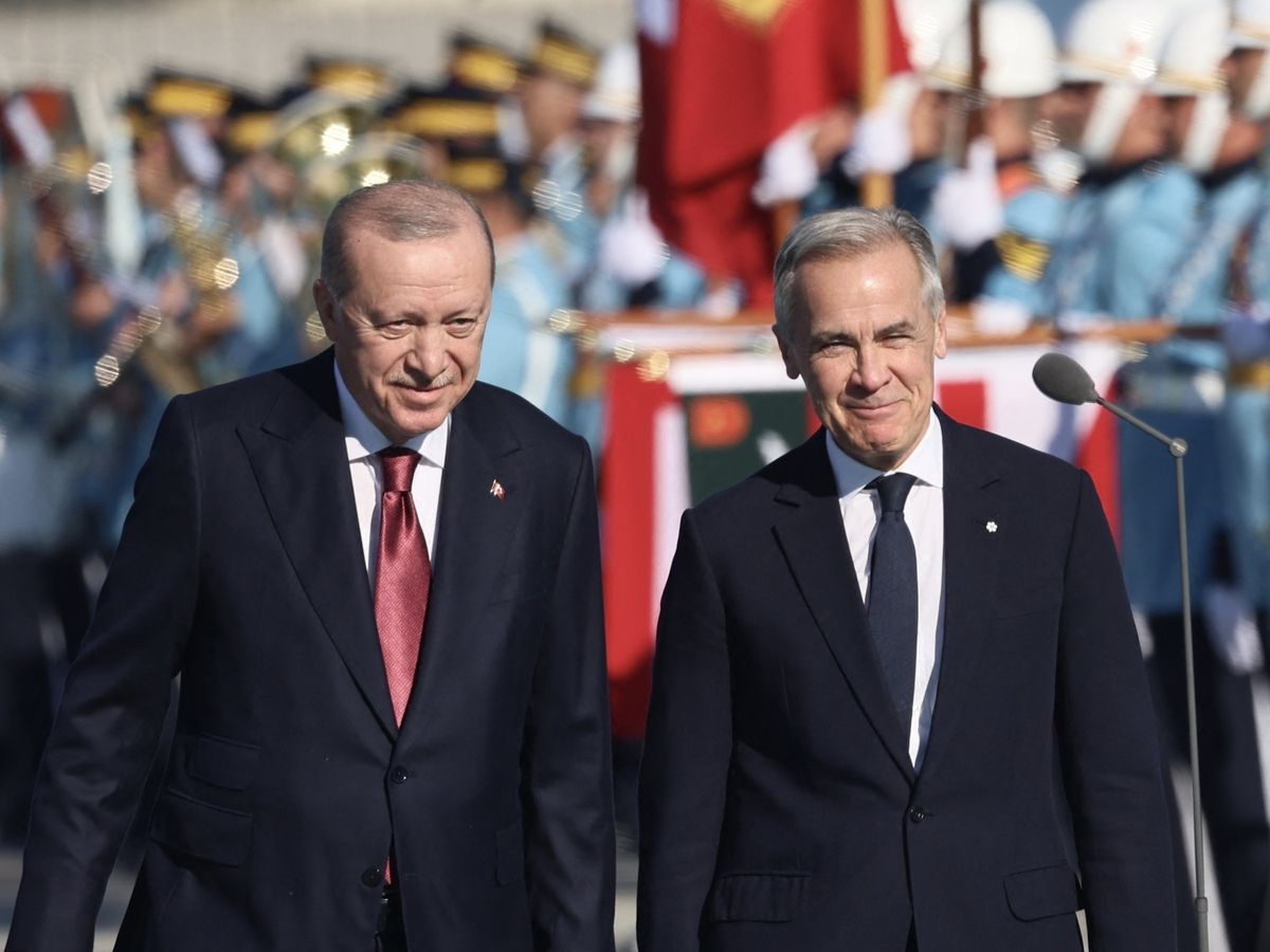 Turkish President Recep Tayyip Erdogan (L) welcomes Canadian Prime Minister Mark Carney (R) during an official ceremony at the Presidential Complex during his official visit to Turkey, in Ankara on October 22, 2026.