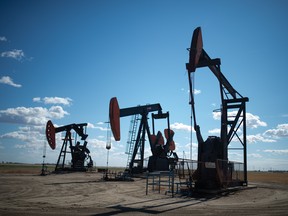 Pumpjacks are seen south of Weyburn, Saskatchewan on Sept. 7, 2021.