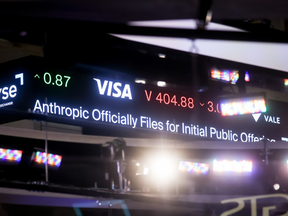 A news ticker displays Anthropic IPO news on the floor of the New York Stock Exchange (NYSE) in New York, US, on Monday, Oct. 26, 2026.