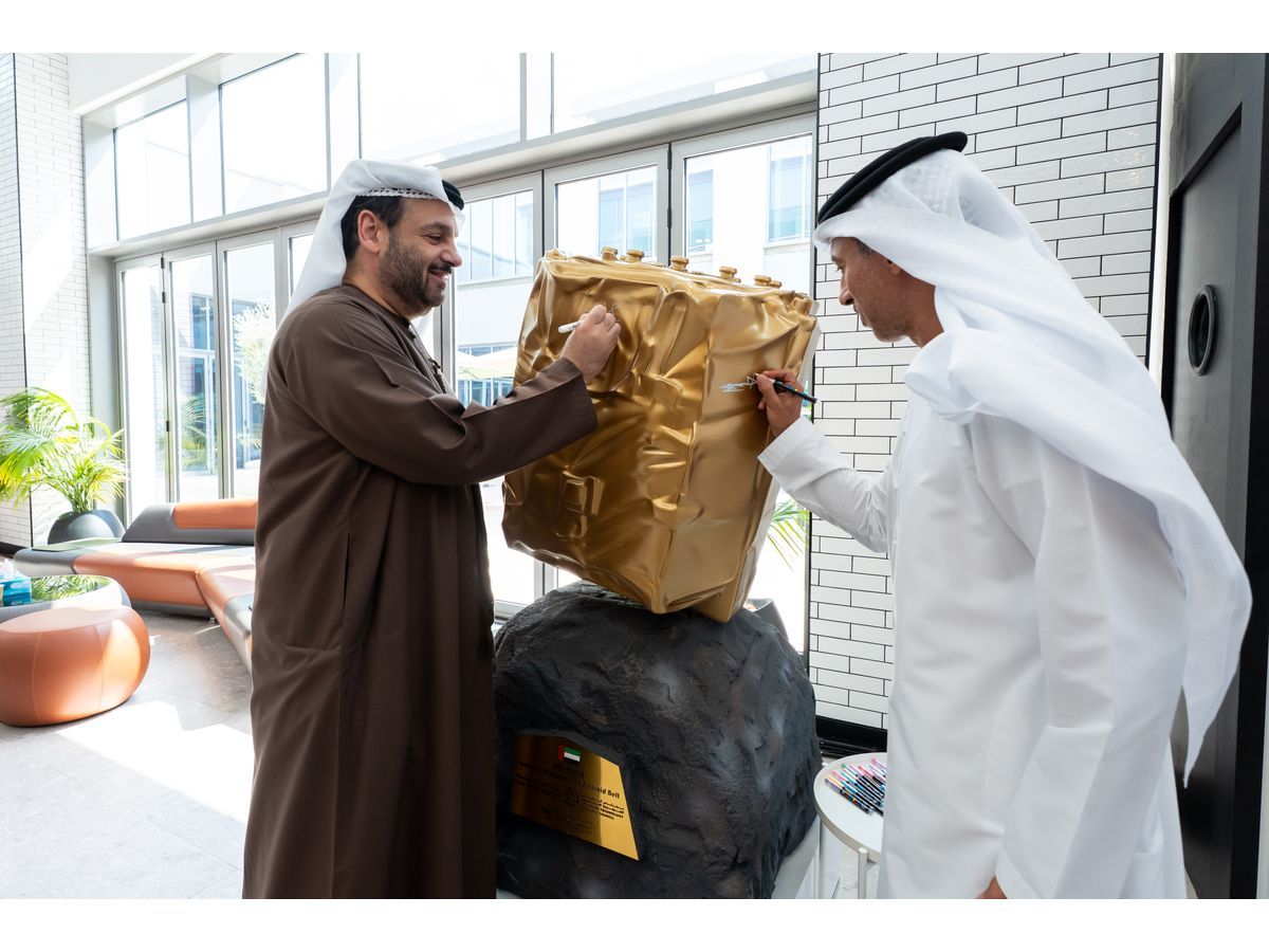 H.E. Faisal Al Bannai, Secretary General of the Advanced Technology Research Council (ATRC), and H.E. Belhoul Al Falasi, Chairman of the UAE Space Agency, sign a model of the UAE-built probe developed by the Technology Innovation Institute (TII) for the Emirates Mission to the Asteroid Belt (EMA). The probe was designed, built and tested in the UAE by TII