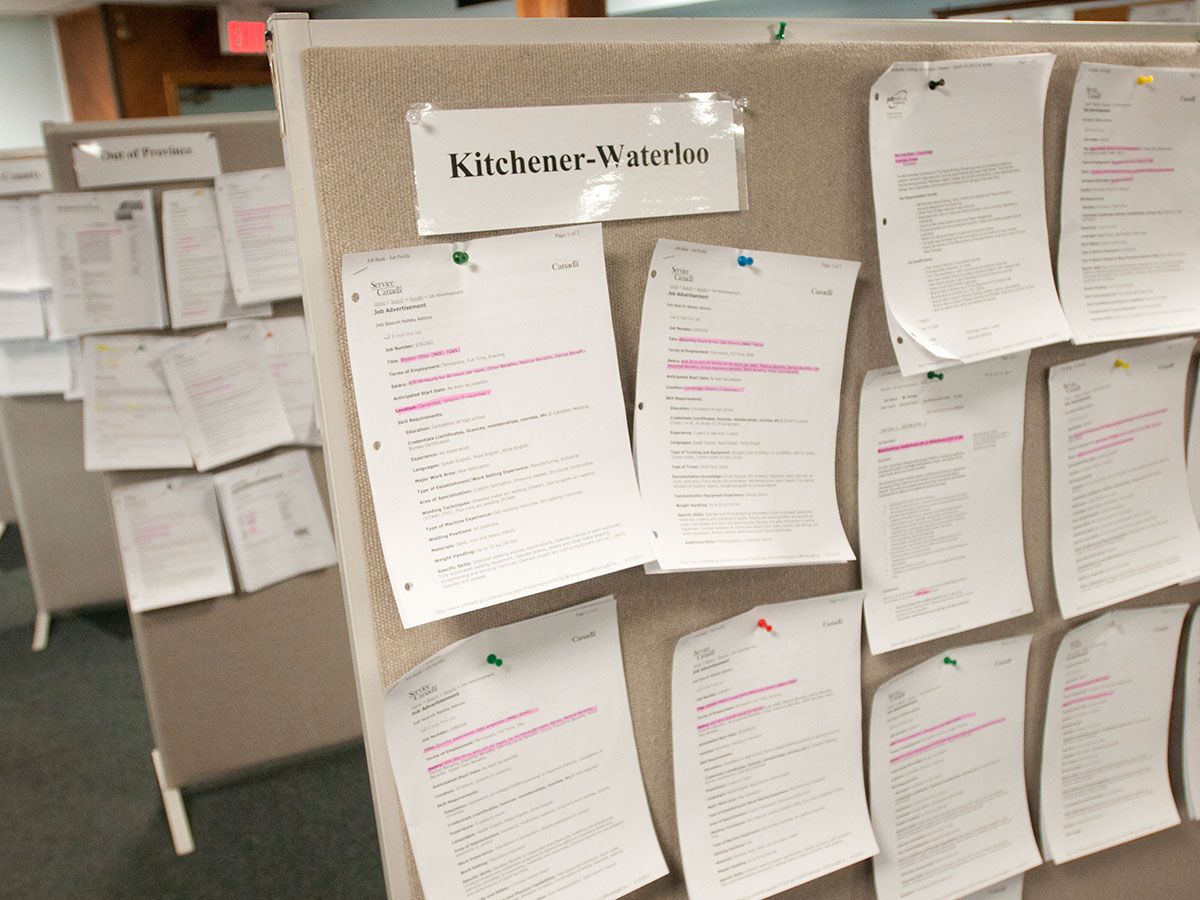 Job postings line bulletin boards at a CAW job action centre in London, Ont.