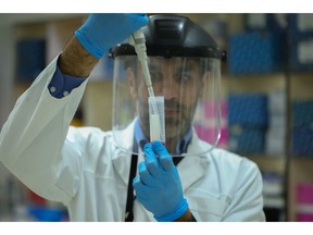 A KFSH scientist working in the research laboratory in Riyadh