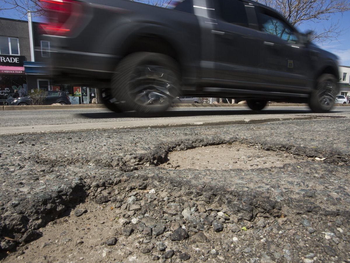 Potholes along Bloor Street West, near Royal York Road in Toronto.