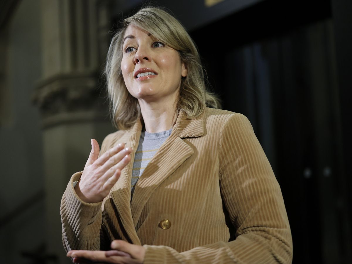 Minister of Industry Mélanie Joly speaks to journalists before a Cabinet meeting on Parliament Hill in Ottawa, Oct. 20, 2026.