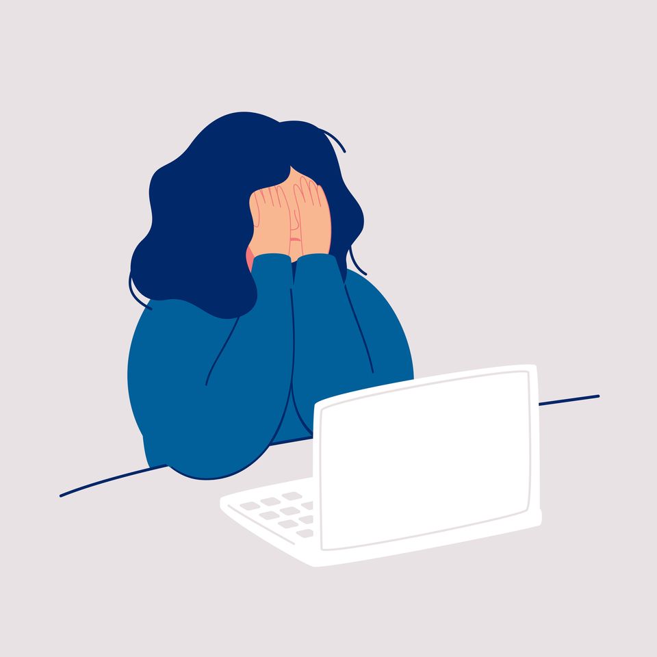 Disheveled woman sits at the computer and crying covering her face with her hands. Weeping woman emotions grief. Concept of solitude and loneliness. Cartoon vector illustration in flat style