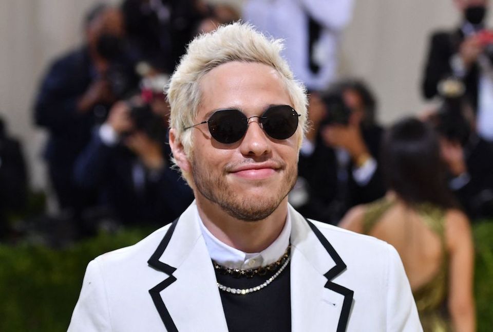 US actor-comedian Pete Davidson in a white suit arrives for the 2021 Met Gala at the Metropolitan Museum of Art