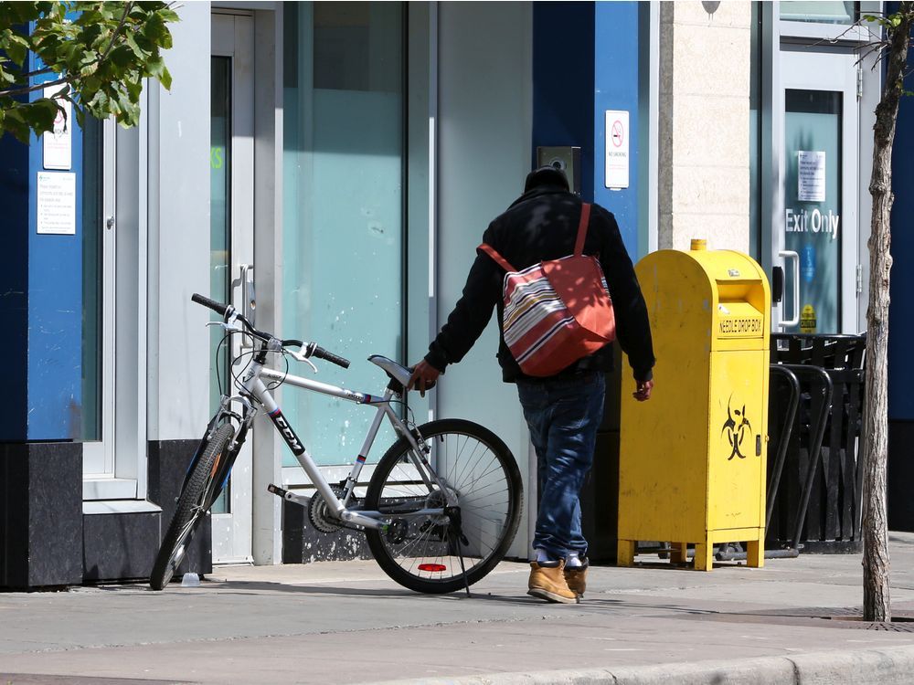 A man enters the safe ingestion site at the Sheldon Chumir Centre in Calgary on Monday Aug. 19, 2019. The provincial government announced the formation of a Supervised Consumption Services Review Committee in August.
