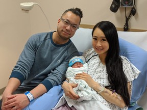 Jack Chieh and Yinnie Wong with their baby boy, born last Friday (Chinese New Year). The couple donate her baby's cord blood to the cord blood bank at B.C. Women’s Hospital & Health Centre.