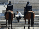 Patrolling mounted police patrol as the spread of COVID-19 continues in Rome, Italy, April 10, 2020.