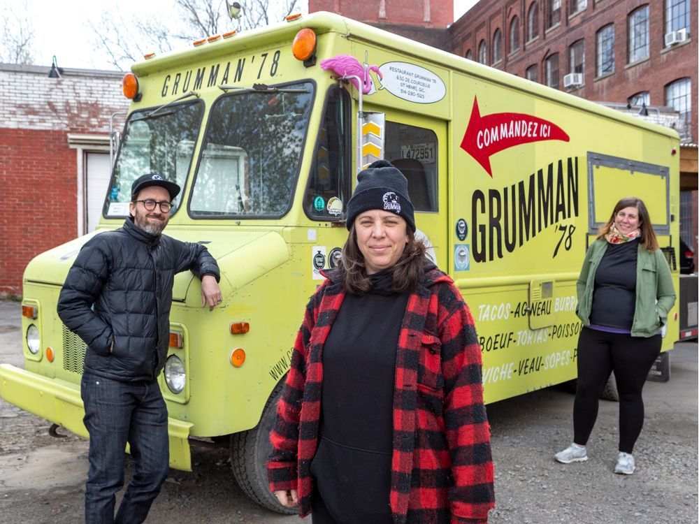 Gaëlle Cerf (centre), Sebastien Harrison Cloudier (left) and Hilary McGown (right) in front of the Grumman '78 restaurant food truck in Montreal on May 12, 2020.