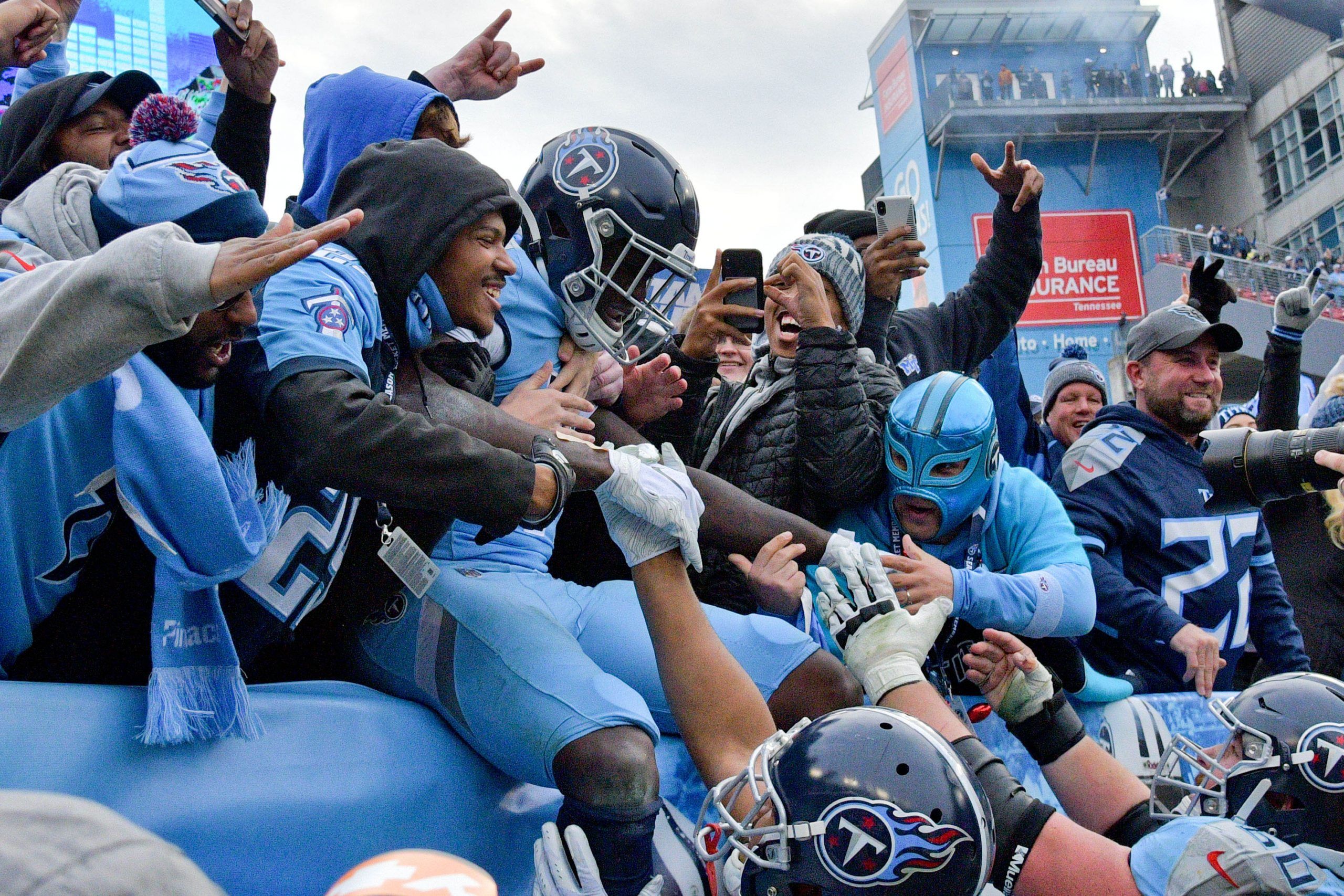 Watching pro sports (whether on TV or up close like these Tennessee Titans fans) can affect viewers at a hormonal level.