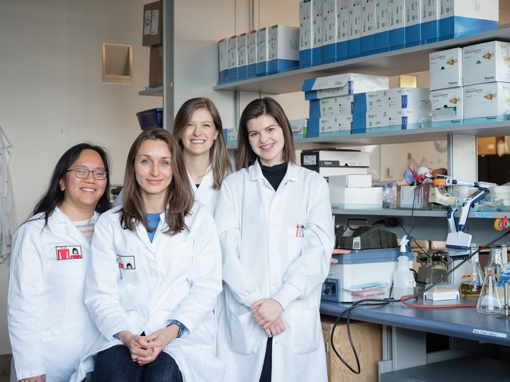  “Having people who come from different backgrounds makes the science much more complete.” Dr. Carolina Tropini (second from left) and her labmates.