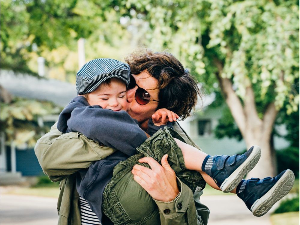 kath stevenson holds her six-year-old son hugo. stevenson is torn on whether to send her immunocompromised son back to school amid the covid-19 pandemic.