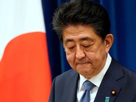 TOPSHOT - Japanese Prime Minister Shinzo Abe gestures during his press conference at the prime minister official residence in Tokyo on August 28, 2020. - Japan's Prime Minister Shinzo Abe announced on August 28, 2020 he will resign over health problems, in a bombshell development that kicks off a leadership contest in the world's third-largest economy. (Photo by Franck ROBICHON / POOL / AFP) (Photo by FRANCK ROBICHON/POOL/AFP via Getty Images)