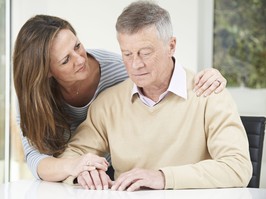 Confused older man with daughter