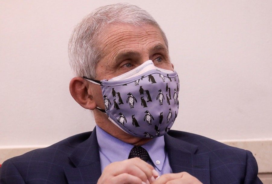 Dr. Anthony Fauci, director of the National Institute of Allergy and Infectious Diseases, double masking.