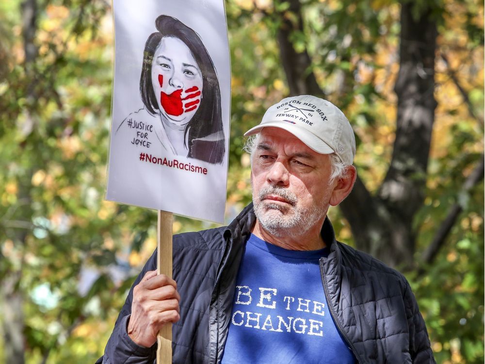 ghislain picard, chief of the assembly of first nations quebec-labrador, holds a sign during the "justice for joyce echaquan" demonstration in montreal on oct. 3, 2020.