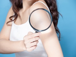 woman with magnifying glass